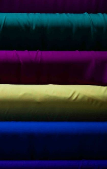BOLTS OF FABRIC IN BOLD COLORS THE CHOICES ONE CAN MAKE WHEN DOING TEAM BRANDING KEEPING IN THE SERATE FOR THRHJ
